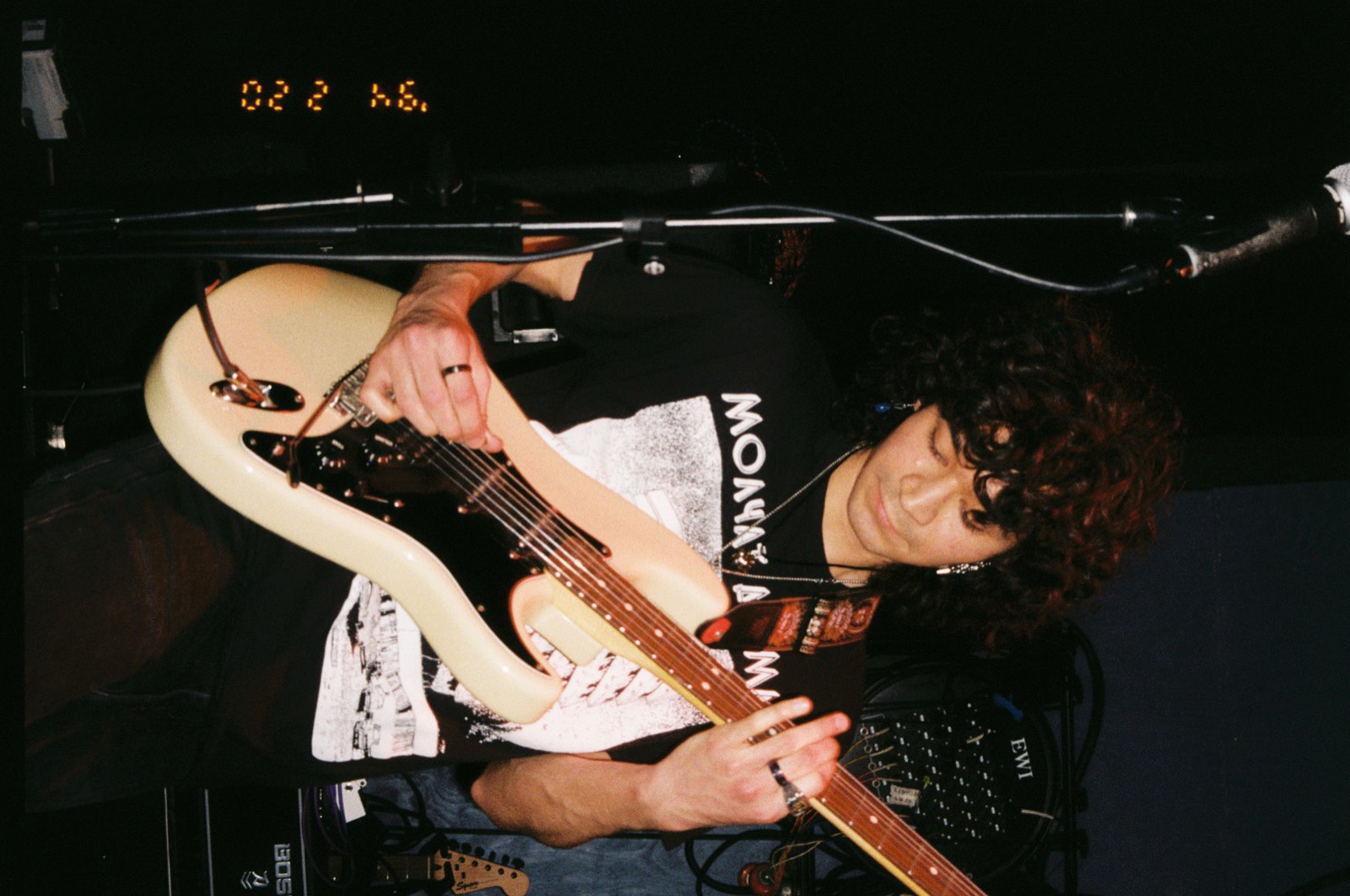 Ian Garcia playing guitar on stage